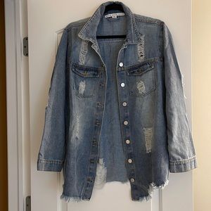 Distressed jean jacket/shirt size medium.